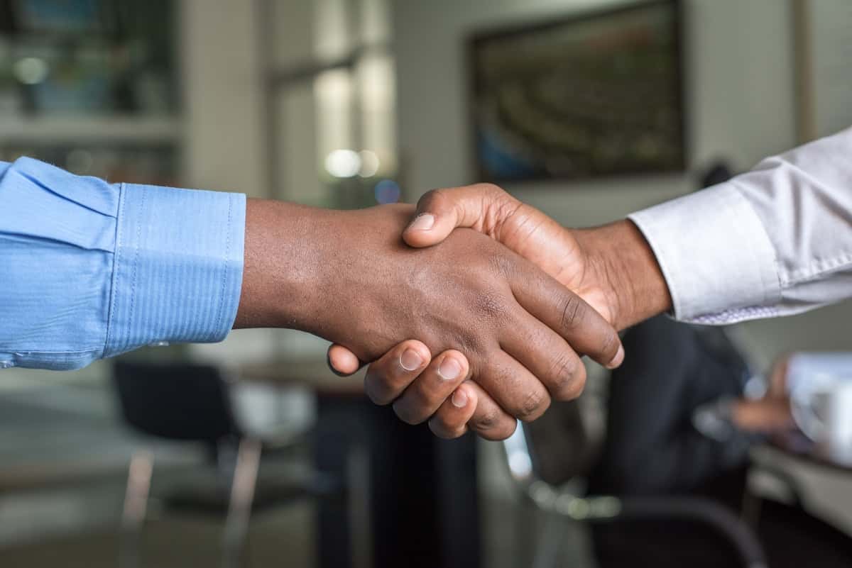 An advisor welcoming a new franchisee